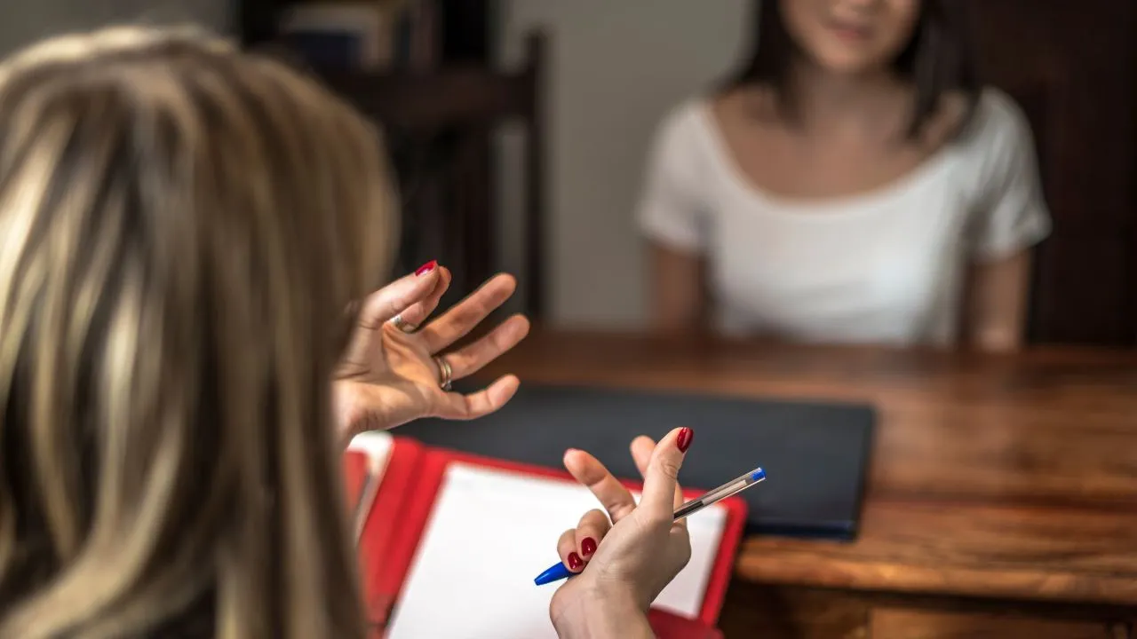 professional psychologist at career counselling session.